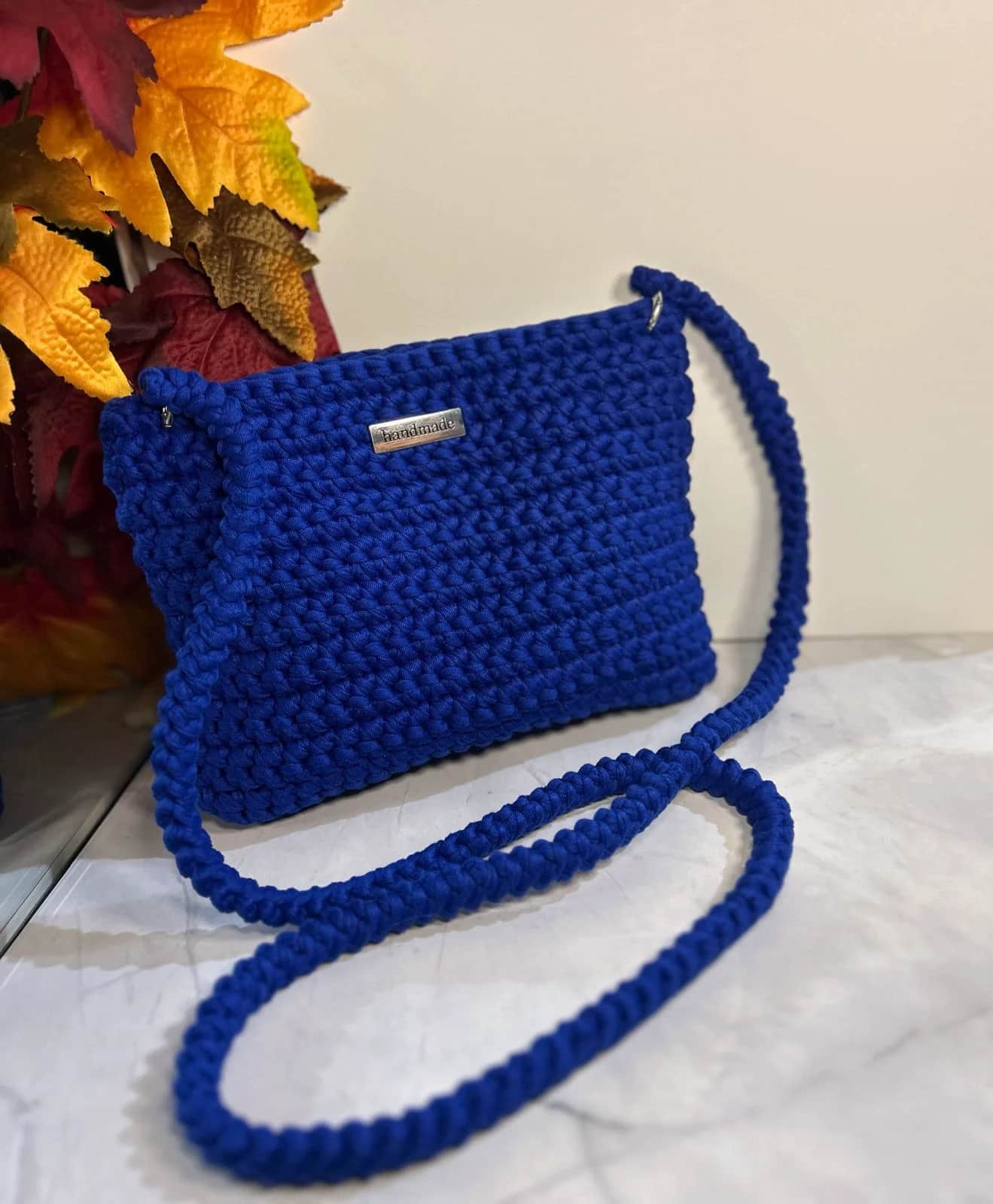 Royal blue crochet crossbody bag with a long matching strap and Handmade plaque